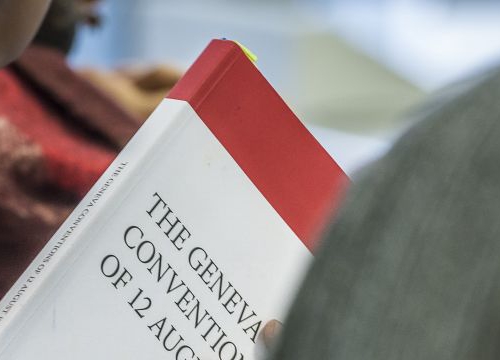 Student of the Executive Master in International Law in Armed Conflict with the book the Geneva Conventions