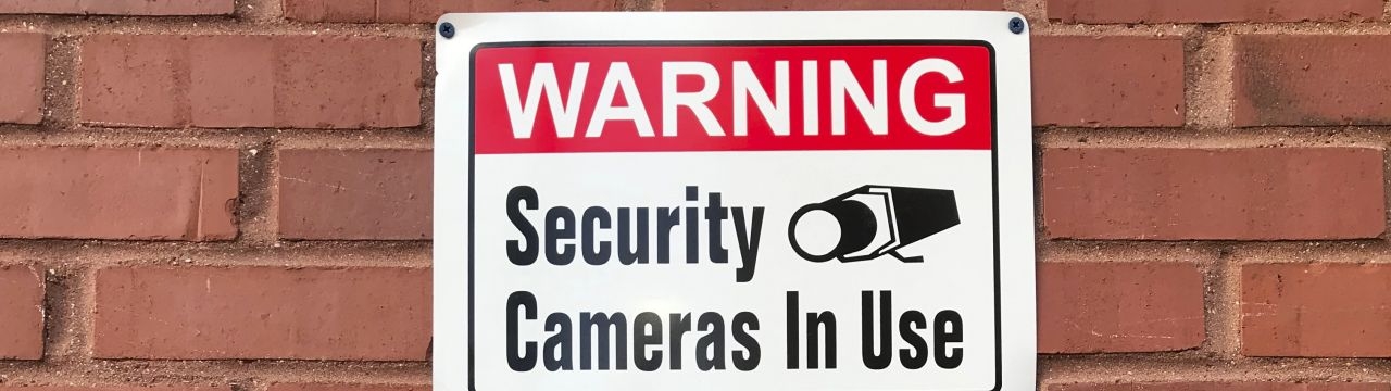 Warning sign about use of camera