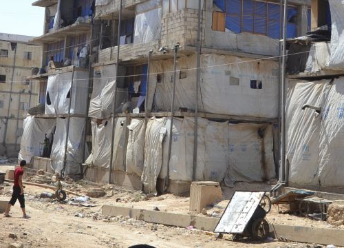 Syria, 2016, outhwestern Aleppo. The ICRC meets displaced families living in collective shelters. 