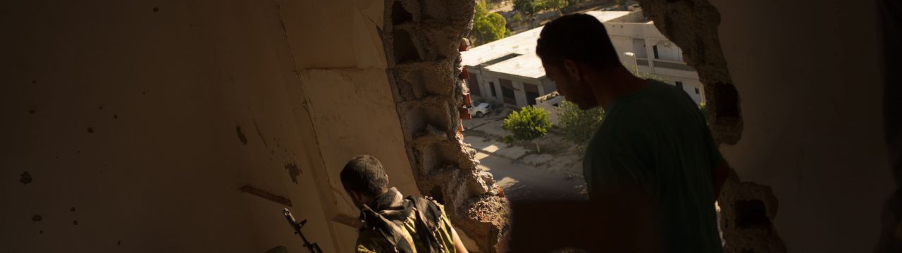 Libya, Fighters are seen in a house during an attack against militants. 