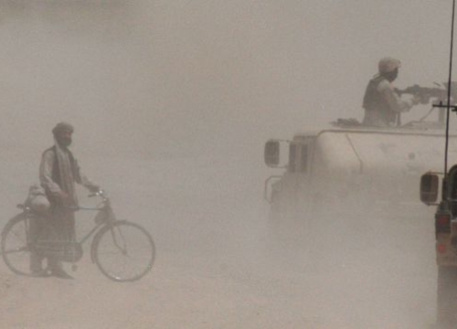 Afghanistan, Khandahar. After a road bomb destroyed a US Army vehicle, troops are patrolling the area to look for clues. 