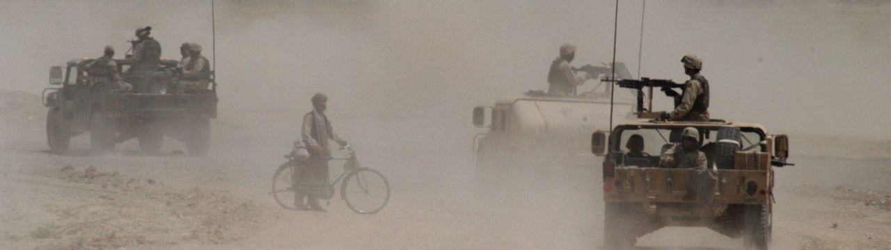 Afghanistan, Khandahar. After a road bomb destroyed a US Army vehicle, troops are patrolling the area to look for clues. 