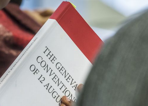 Student of the Executive Master in International Law in Armed Conflict with the book the Geneva Conventions