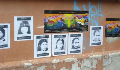 Guatemala, photos of disappeared on a wall