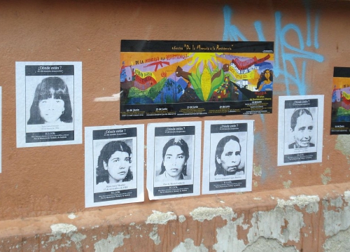 Guatemala, photos of disappeared on a wall