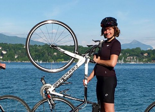 The four LLM students with their bicycle