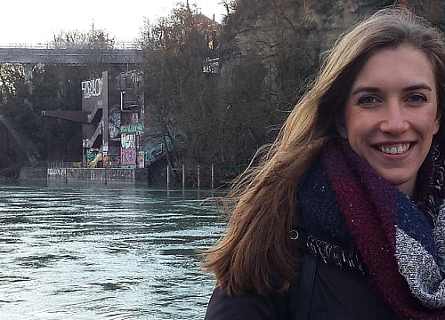 Annabelle Gagnon, LLM student at the Geneva Academy, in front of the Pointe de la Jonction in Geneva