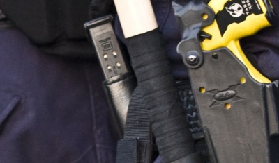 Policeman with a TASER X26