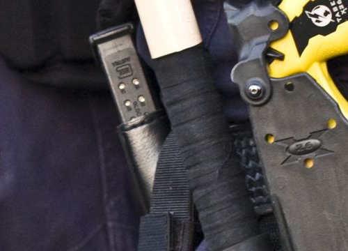 Policeman with a TASER X26