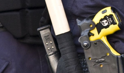 Belt of police officers with a Taser