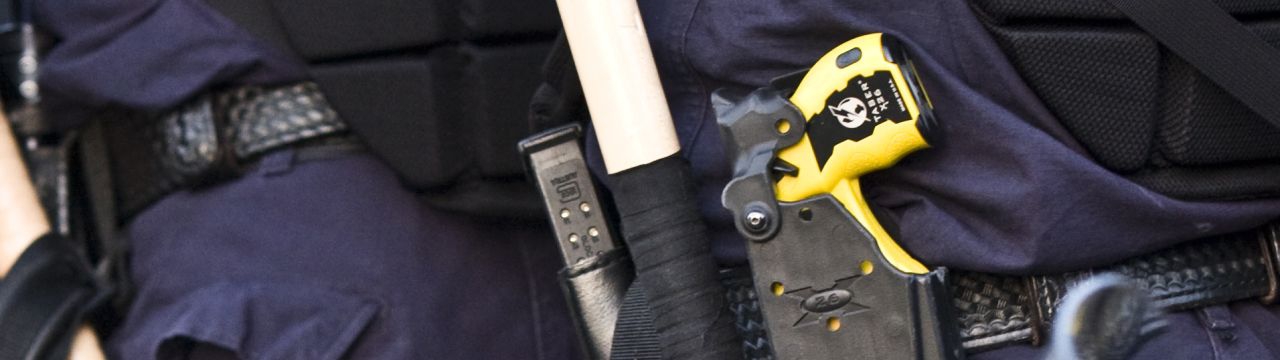 Belt of police officers with a Taser