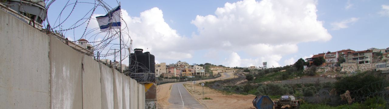 West Bank, Qalqilya, enclaved village of Azun Atme. Azun Atme check-point and West Bank barrier between Beit Amin and the settlement of Sha'arei Tikva