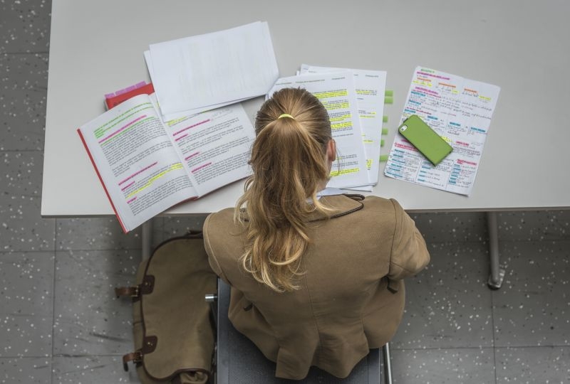 Student revising at her desk