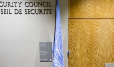 A man enters the room of the UN Security Council