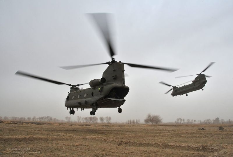 Afghanistan, Two Royal Air Force Chinook helicopters take off after deploying soldiers from the QRH (The Queen's Royal Hussars) Battle Group on Operation Zmaray Ibda (Lions' Discovery).