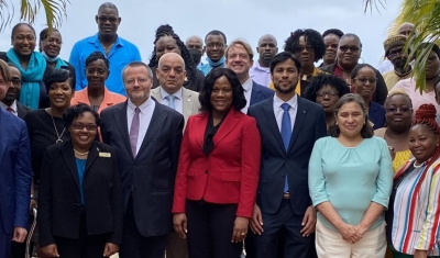 A group photo of participants in the pilot focused review