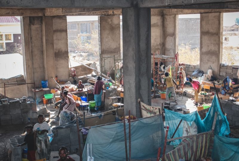 Tigray: Hundreds of people in Shire’s University IDP site live in an unfinished building, where they sleep, cook and eat. Many don’t have mattresses or blankets. 