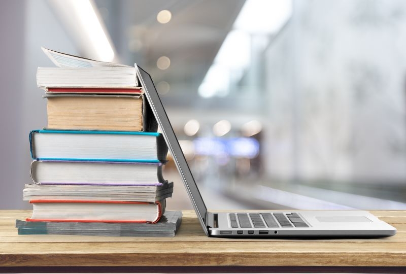 Books and a laptop